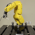 the-fanuc-lr-mate-200ic-industrial-robot-with-the-probe-and-the-calibration-artifact